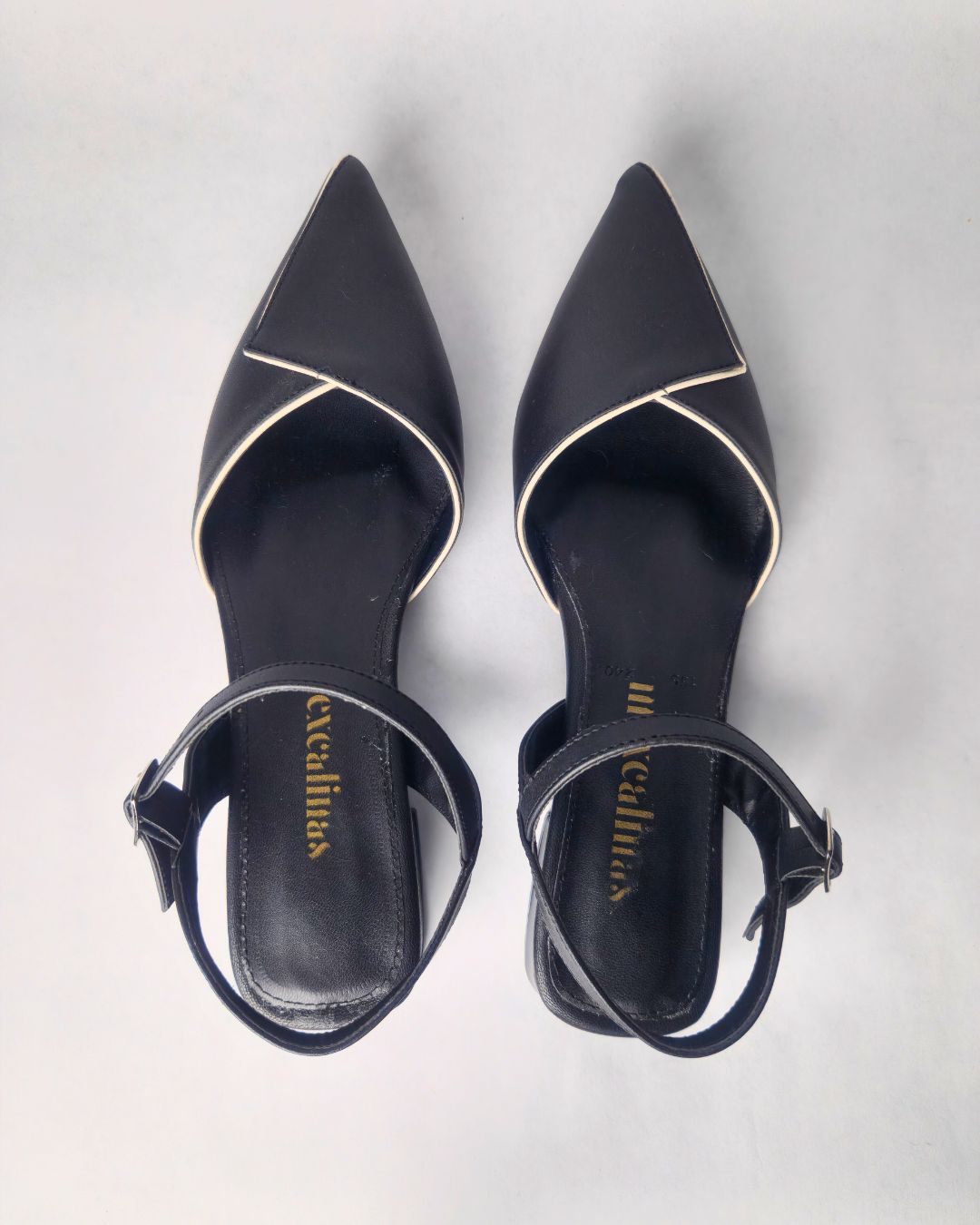 tacon alameda negro punta fina contraste blanco suela acolchada correa negra mexcalinas